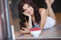 Home portrait of a happy woman with ripe berries Royalty Free Stock Photo