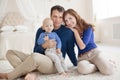 Home portrait of happy young family. Royalty Free Stock Photo