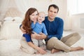 Home portrait of happy young family. Royalty Free Stock Photo