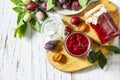 Delicious plum jam on a wooden table. Top view flat lay. Copy space Royalty Free Stock Photo