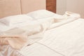 Home recreation empty messy bed wrinkled blanket Royalty Free Stock Photo