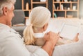 Home, relax and senior couple on a couch, tablet and love with mockup space, website info and search internet. Romance Royalty Free Stock Photo