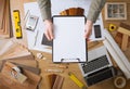 Home renovation concept with blank clipboard Royalty Free Stock Photo