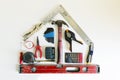 Home renovation concept. Shape of a house from construction tools. Royalty Free Stock Photo