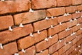 Process of making a red brick wall, home renovation Royalty Free Stock Photo