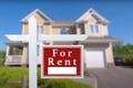 Home for rent. Sign in front of new home. Royalty Free Stock Photo