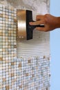 Home repair: installing the mosaic tile on the wall