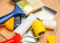 Home repair tools on wooden background.