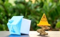 Home, Risky coin stack and Warning label.Financial crisis concept.Investing to buy a home is risky. Royalty Free Stock Photo