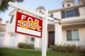 Home For Sale Real Estate Sign in Front of New House Royalty Free Stock Photo