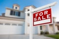 Home For Sale Real Estate Sign in Front of New House Royalty Free Stock Photo