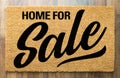 Home For Sale Welcome Mat On A Wood Floor Background Royalty Free Stock Photo