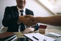 Home sales agents and buyers work on signing new homes and shaking hands Royalty Free Stock Photo