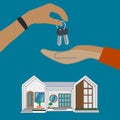 The home salesman and the key to the new owner. The concept of selling and renting house.