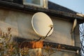 Home satellite dish on wall Royalty Free Stock Photo