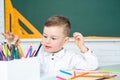 Home schooler. Concept of education and reading. Cute little boy studying.