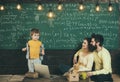 Home schooling. Home schooling pupil at chalkboard. Home schooling education with parents. Family choose home schooling Royalty Free Stock Photo