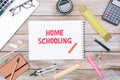 Home Schooling in notepad on table Royalty Free Stock Photo