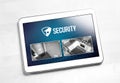 Home security system and application in tablet. Royalty Free Stock Photo