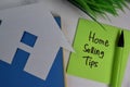 Home Selling Tips write on sticky notes isolated on office desk