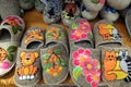 home slippers made of felted wool with a variety of colored appliquÃÂ©s