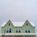 Home with snowy roof and Christmas lights in Utah Royalty Free Stock Photo