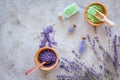 Home spa with lavender herbs cosmetic salt for bath on stone desk background top view mock-up Royalty Free Stock Photo