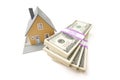 Home and Stacks of Money Isolated Royalty Free Stock Photo