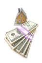 Home and Stacks of Money Isolated Royalty Free Stock Photo