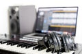 Home Studio Equipment with keyboard and headphone Royalty Free Stock Photo