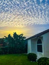 sunset and pretty clouds in the back yard Royalty Free Stock Photo