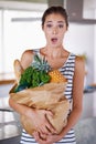 Home, surprise or portrait of woman with groceries on promotion, sale or discounts deal on nutrition. Wow, news offer or Royalty Free Stock Photo