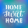 Home sweet home - Hand drawn lettering quote on abstract blue purple background with bokeh light effect for card, print or poster