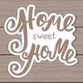 Home sweet home. Hand lettering typography poster. Calligraphic inscription, Conceptual handwritten phrase. Royalty Free Stock Photo