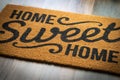 Home Sweet Home Welcome Mat Resting on Floor Royalty Free Stock Photo