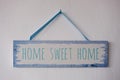 Home sweet home, wooden text on vintage board