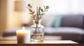 A Home Table Graced with a Reed Diffuser, Burning Candle, Eucalyptus Branches, and Perfume for a Hygge Experience Royalty Free Stock Photo