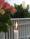 Home terrace with flowers and candle light