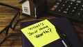 Home Valuation Question: 'What's Your Home Worth?' Note with Model House and Calculator Royalty Free Stock Photo