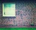 Home wall and windows with flower pots. Royalty Free Stock Photo
