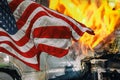 A home was burned by the homes were lost to the blaze and the American Flag Royalty Free Stock Photo