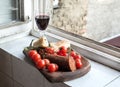 Home wine appetizer set. Glass of red wine