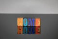 Home word from colored wooden letters