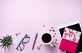 Home work. Business flat lay with cup of coffee, note, pencil, eye glasses, tablet and sicculent on pink background Royalty Free Stock Photo