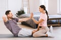 Sporty Couple Training Together Doing Abs Exercise At Home Royalty Free Stock Photo