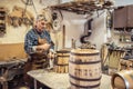 Home workshop of a craftsman who builds wooden barrels for whisky or wine with his own hands