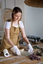 The process of decorating do it yourself. woman works with flowers in a small home workshop. Entrepreneurs lifestyle