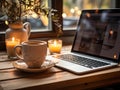 Home workspace coffee mug and laptop