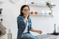 Homebody recovering water balance on hot day in apartment