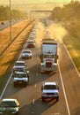 Homebound traffic crawls on the freeway to the outer suburbs in the heat